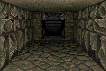 bcdfz — levels 6–11 (bone / cream) — a locked door’s ornate iron decoration, dead ahead (map bcdfg @ 9,13 facing N)